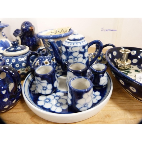 83 - Pair of strawberry storage jars, collection of miniature blue and white teawares, vases, leaf moulde... 