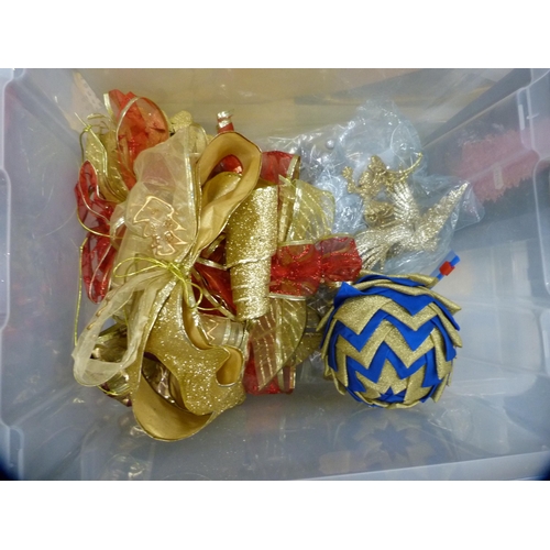 94 - Large collection of Christmas decorations including wreaths, baubles etc.