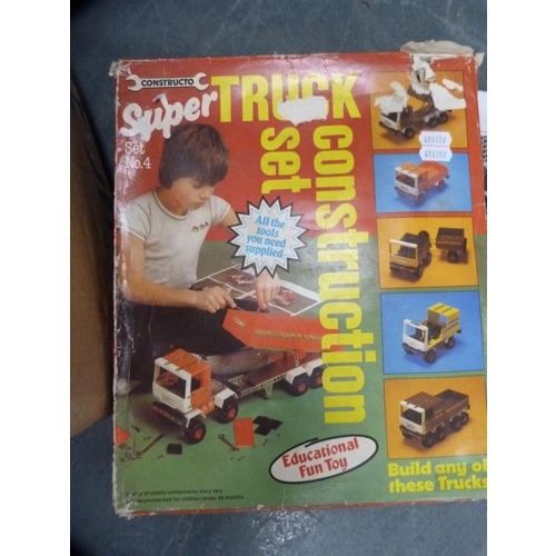 30 - Collection of boxed games, model vehicles in display cabinet and other vehicles, model aircraft etc.