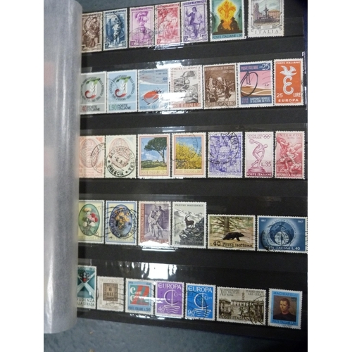 182 - Folders containing assorted world stamps.