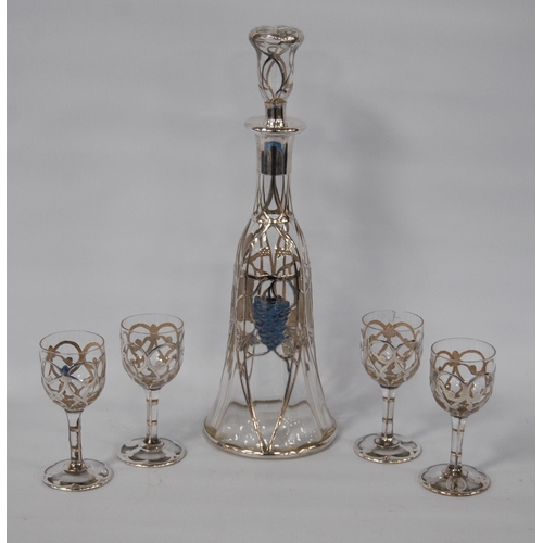 105 - Silver overlaid glass liqueur set comprising a decanter and stopper, and four matching glasses, over... 