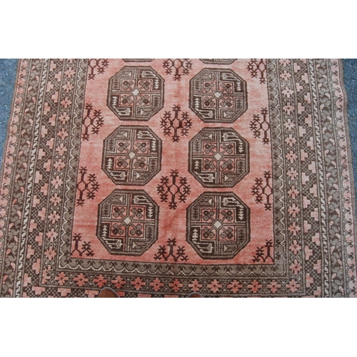 299 - Antique Afghan hand-knotted rug with two rows of four geometric octagonal medallions interspersed by... 