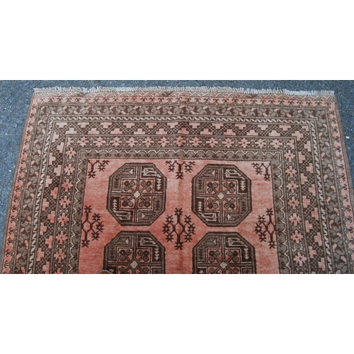 299 - Antique Afghan hand-knotted rug with two rows of four geometric octagonal medallions interspersed by... 