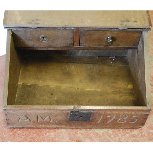 347 - 18th century oak bible box, the hinged slope enclosing two short drawers, inscribed 'AM 1785' to fri... 