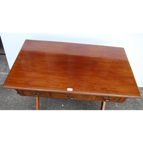 349 - Mahogany campaign-style writing table, c. early 20th century, with large pull-out drawers containing... 