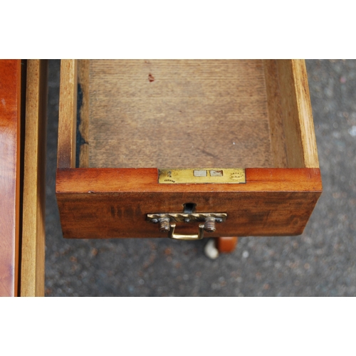 349 - Mahogany campaign-style writing table, c. early 20th century, with large pull-out drawers containing... 