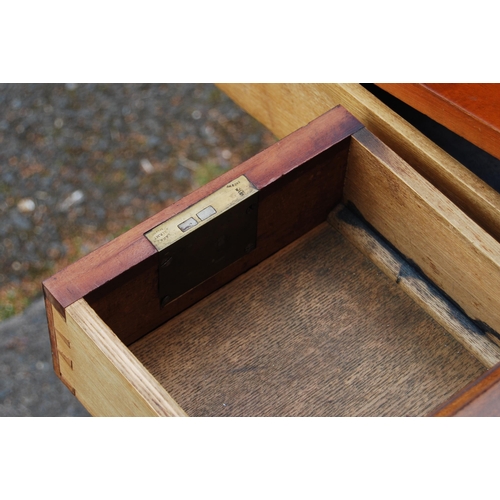 349 - Mahogany campaign-style writing table, c. early 20th century, with large pull-out drawers containing... 