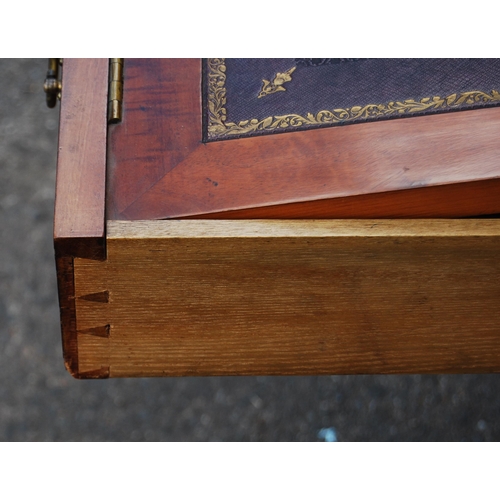 349 - Mahogany campaign-style writing table, c. early 20th century, with large pull-out drawers containing... 