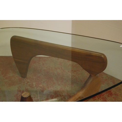 350 - In the Manner of Sika MøblerRetro Danish teak designer coffee table with shaped glass top, possibly ... 