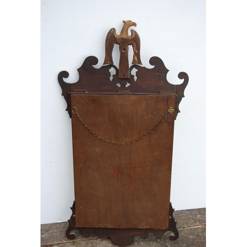 355 - Regency-style mahogany scroll wall mirror with gilt eagle surmount to the top, 101.5cm high and 53cm... 