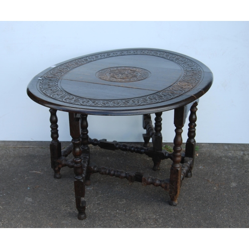 356 - Antique oak gateleg supper table in the Charles II style, with all over banding of motifs to the top... 