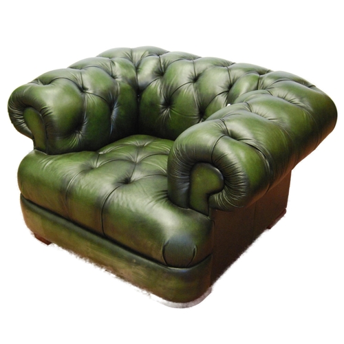 357 - Chesterfield club-style green three-seater sofa and a matching armchair, sofa approximately 60cm hig... 