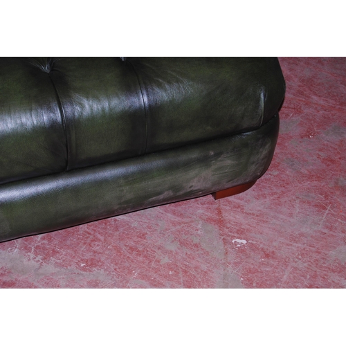 357 - Chesterfield club-style green three-seater sofa and a matching armchair, sofa approximately 60cm hig... 