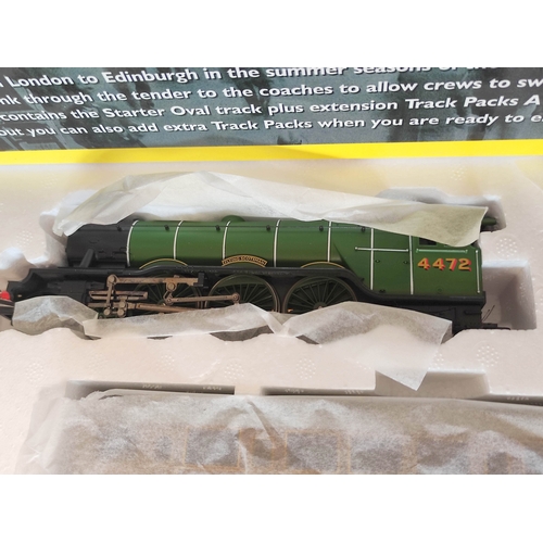 103 - Hornby. Boxed 00 Gauge Flying Scotsman Electric Train Set, comprising of locomotive and tender, four... 