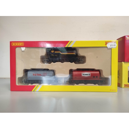 107 - Hornby Railways. Eight boxed 00 gauge rolling stock and locomotives to include R2672 Class 0F Pug 0-... 