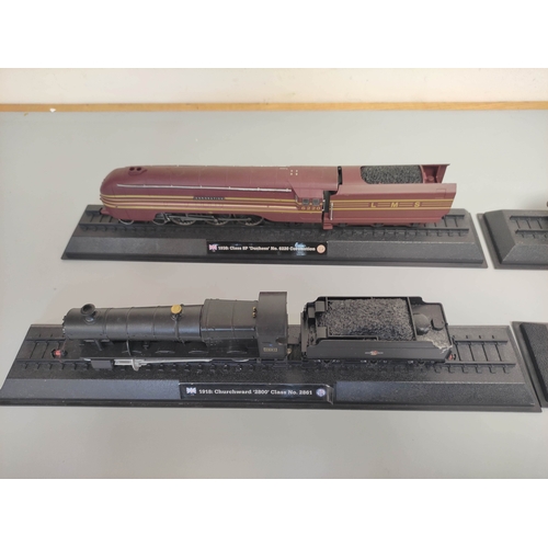 111 - Five collectors model trains on stands to include BR Class 5MT 4-6-0, BR Class 9F Evening Star, LNER... 