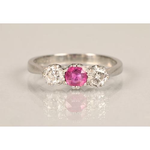 104 - Ladies platinum diamond & ruby ring, central ruby 0.5 carat with a 0.5 carat diamond on either s... 