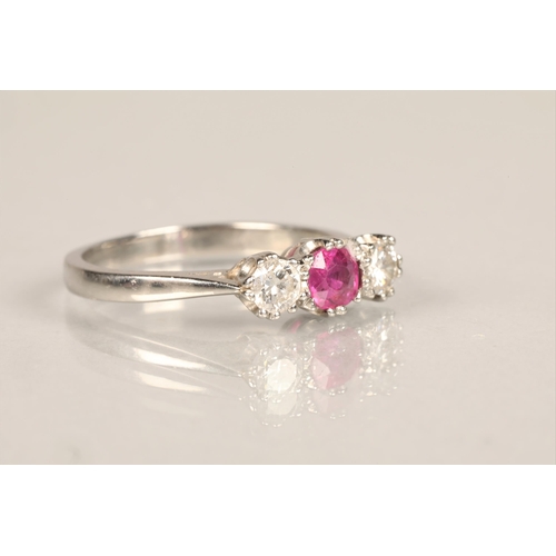 104 - Ladies platinum diamond & ruby ring, central ruby 0.5 carat with a 0.5 carat diamond on either s... 