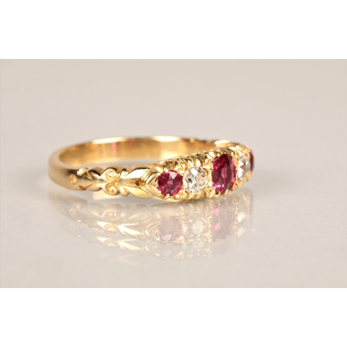 106 - Ladies diamond & ruby ring, three graduated rubies interspersed by two 0.1 carat diamonds set on... 