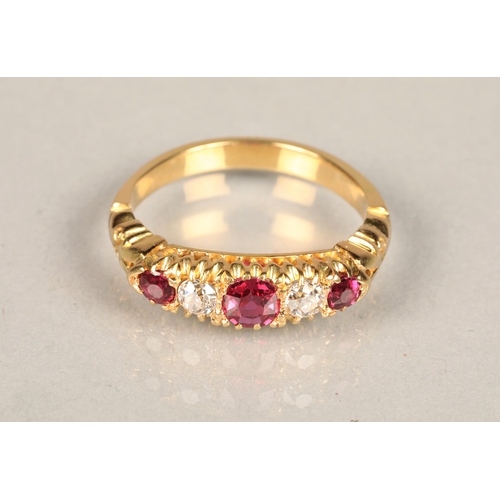 106 - Ladies diamond & ruby ring, three graduated rubies interspersed by two 0.1 carat diamonds set on... 