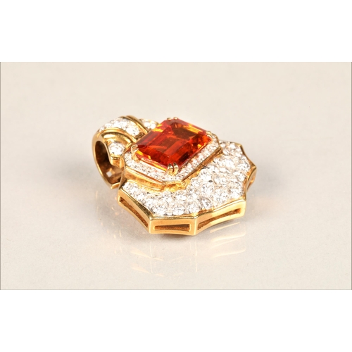 107 - Ladies 18ct yellow gold orange sapphire & diamond cluster pendant, central emerald cut orange sa... 