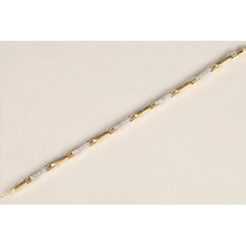 114 - Ladies 18ct white & yellow two-tone gold bracelet, set with diamond chips, length 19cm, weight 1... 