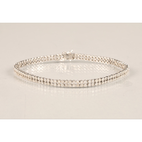 115 - Ladies 9k white gold diamond bracelet, set with two rows of small diamonds, length 19.5cm