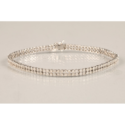 115 - Ladies 9k white gold diamond bracelet, set with two rows of small diamonds, length 19.5cm