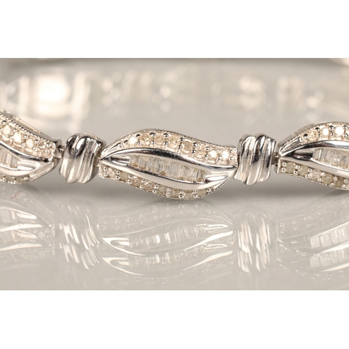 116 - Ladies 9ct white gold diamond bracelet, each link with brilliant and baguette cut diamonds, length 1... 