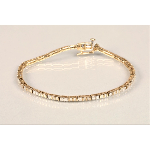 117 - Ladies 9ct yellow gold diamond tennis bracelet, consisting of baguette and brilliant cut diamonds, l... 