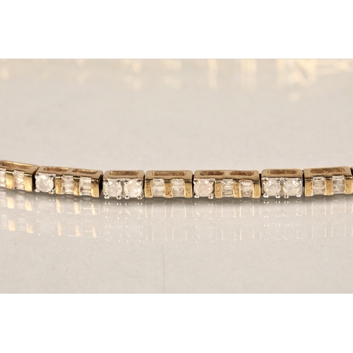 117 - Ladies 9ct yellow gold diamond tennis bracelet, consisting of baguette and brilliant cut diamonds, l... 