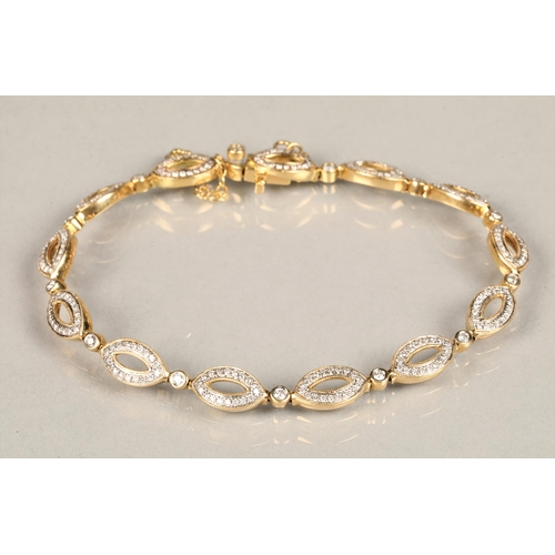 119 - Ladies 18k yellow gold diamond set bracelet, each link set with eighteen small diamonds interspersed... 