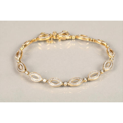 119 - Ladies 18k yellow gold diamond set bracelet, each link set with eighteen small diamonds interspersed... 