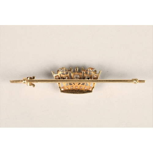 128 - Ladies 15ct gold and platinum diamond bar brooch in the form of a crown, set with three central old ... 