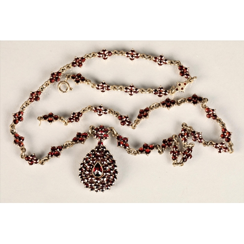 129 - Ladies Victorian garnet necklace, central teardrop garnet surrounded by a cluster of garnets in tear... 