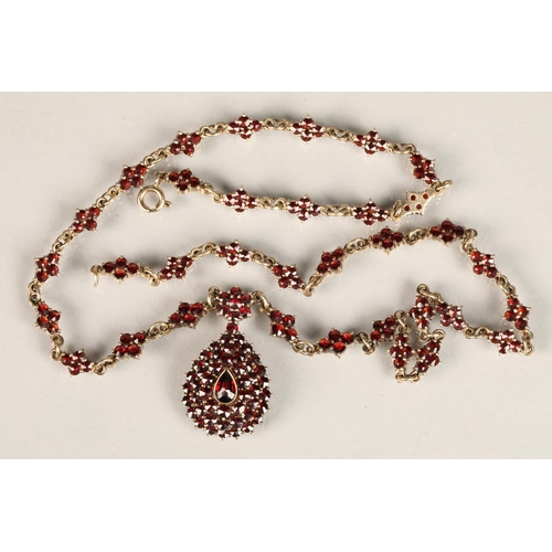 129 - Ladies Victorian garnet necklace, central teardrop garnet surrounded by a cluster of garnets in tear... 