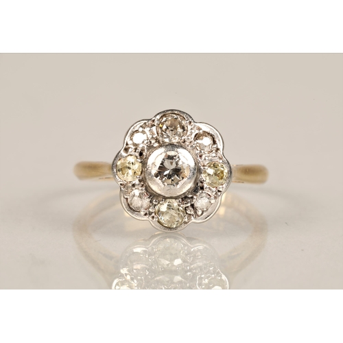 130 - Ladies 18ct yellow gold daisy diamond cluster ring set with a platinum mount, ring size L