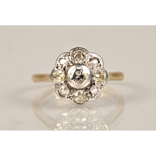 130 - Ladies 18ct yellow gold daisy diamond cluster ring set with a platinum mount, ring size L