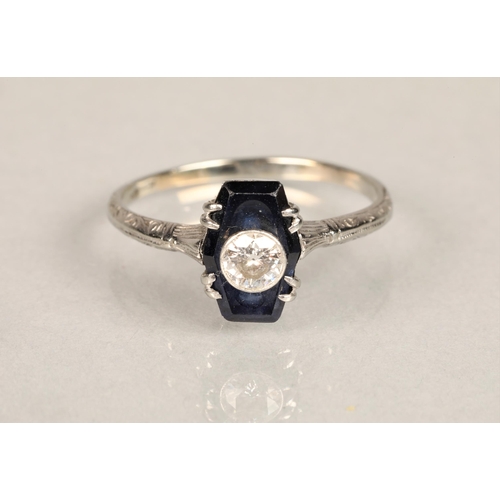 137 - Ladies diamond and sapphire ring, 0.25 carat diamond set in the centre of a sapphire set on unmarked... 