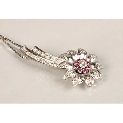 141 - Ladies diamond & ruby floral spray pendant, central stone 0.25 carat surrounded by eight smaller... 