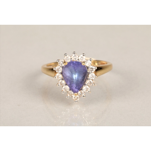 145 - Ladies 18k gold tanzanite and diamond ring, central teardrop tanzanite surrounded by sixteen small d... 