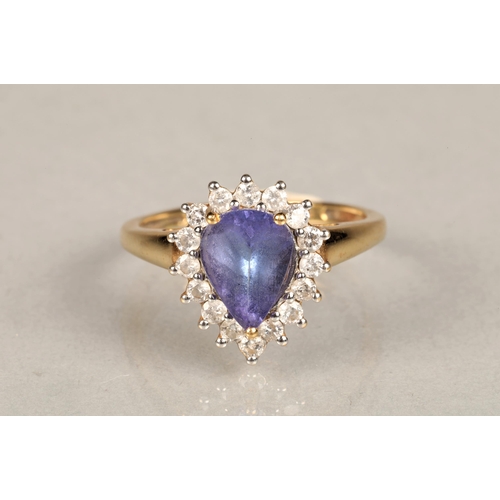 145 - Ladies 18k gold tanzanite and diamond ring, central teardrop tanzanite surrounded by sixteen small d... 