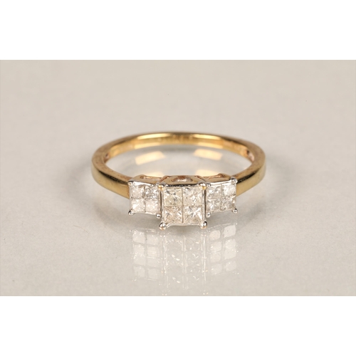 146 - Ladies 9ct gold diamond ring set with three sets of four diamonds in square mounts set on an 9ct yel... 