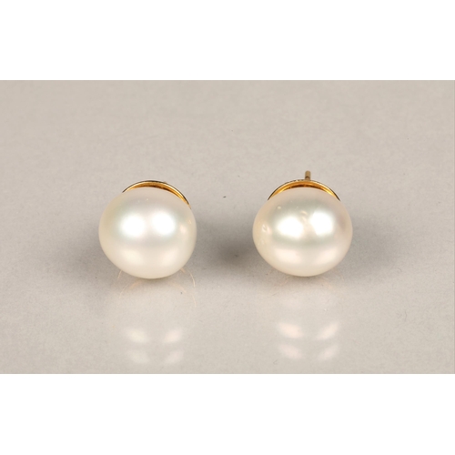 153 - Pair of 18ct yellow gold mounted pearl earrings. Probably South sea pearls, diameter 1.2cm