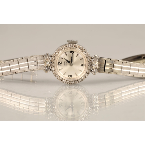 165 - Ladies 9ct white gold Tudor royal wrist watch, silver dial with hour markers with numbers at every q... 