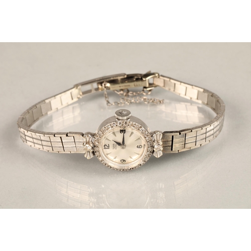 165 - Ladies 9ct white gold Tudor royal wrist watch, silver dial with hour markers with numbers at every q... 