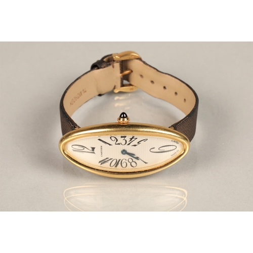 166 - Ladies Cartier Baignoire Allongee 18k yellow gold wrist watch, slivered  dial with numeral hour mark... 