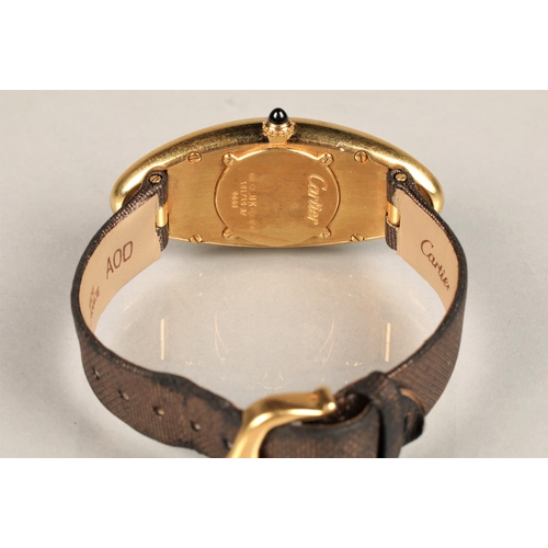 166 - Ladies Cartier Baignoire Allongee 18k yellow gold wrist watch, slivered  dial with numeral hour mark... 