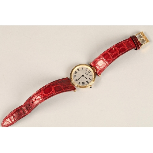 167 - Ladies 18ct yellow gold Dunhill wrist watch, silver dial with roman numeral hour markings on a leath... 