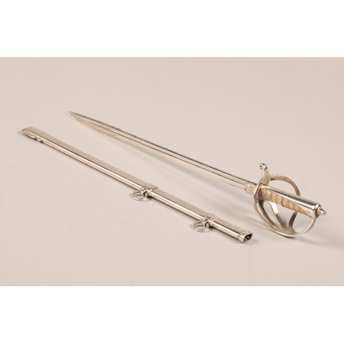 183 - Late Victorian letter opener in the form of a sword and scabbard, assay marked London 1896. Sampson ... 